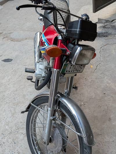 honda 125 red color all ok bike for sale documenets clear