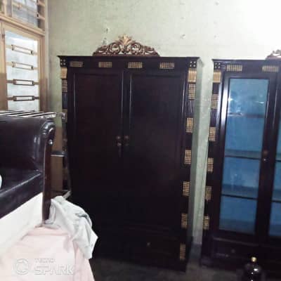 wooden bed + wardrobes