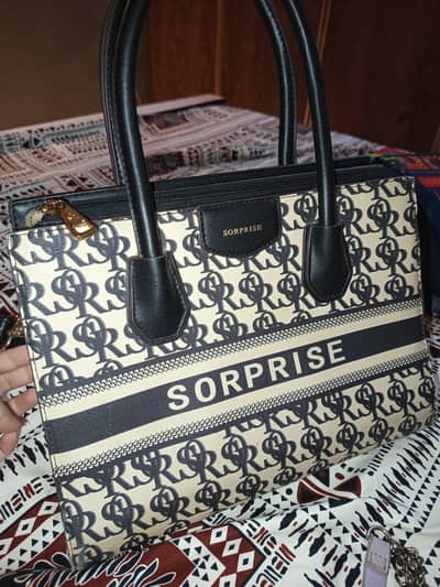 selling preloved branded bags at a low price hand bag