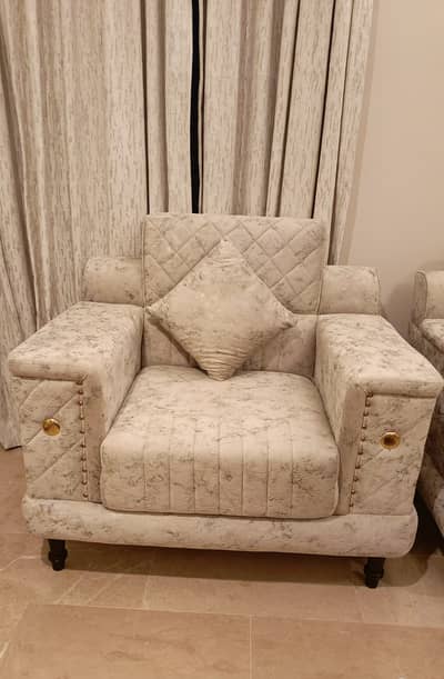 Grayish white new design 7 seater sofa set.