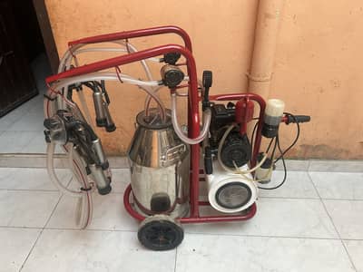 Double cluster milking machine