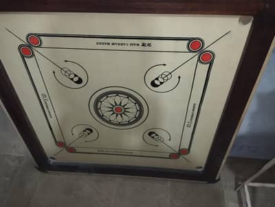 carrom board barely used with chemical and mens