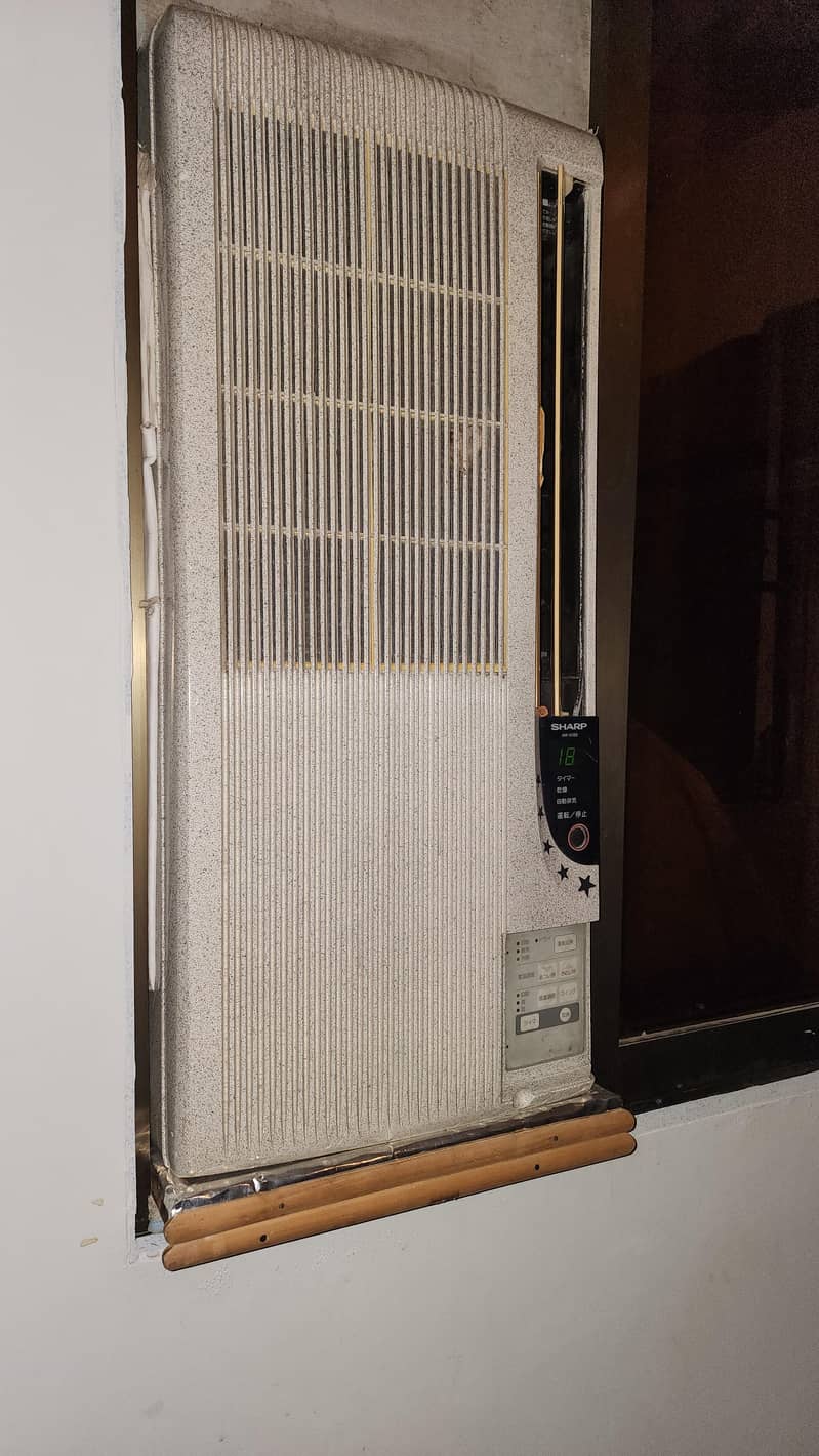 sharp window AC 1