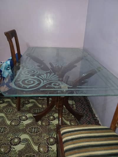 Dining table with 6 chairs with heavy glass