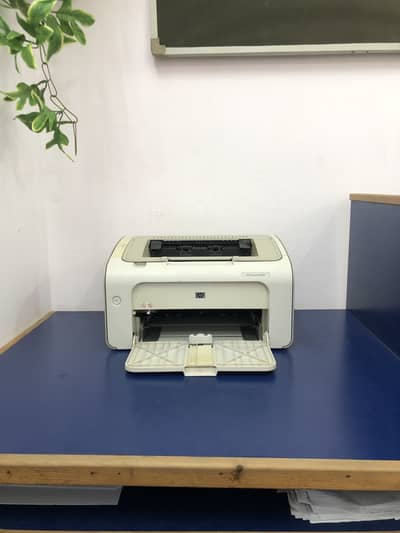 Hp P1005