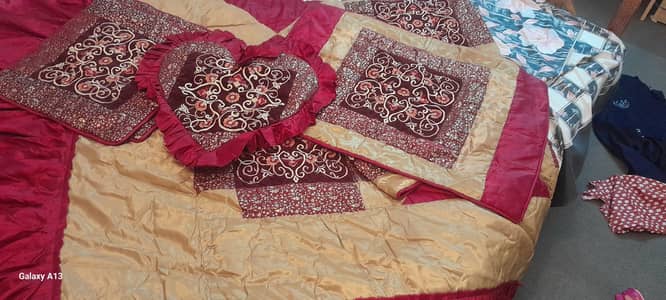 heavy emroided quilted bed sheet not used much