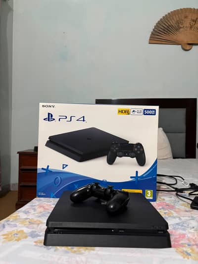 playstation 4 slim . . . 500 GB . . . Original controller
