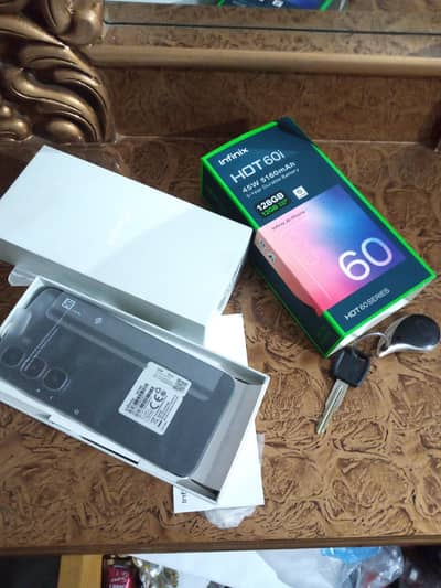 Infinix hot 60I 5month wartty 10/9.5 box charger complete