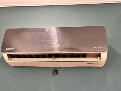 Orient Glass Model 1 Ton AC in Running Condition with perfect cooling