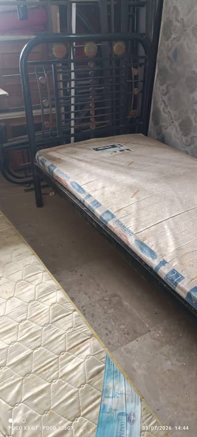 single iron bed