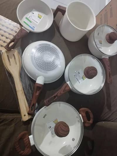 brand new untouched non stick set