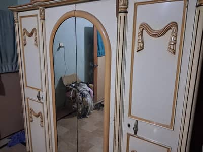 three door wooden wardrobe