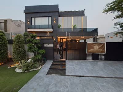 1 KANAL ELEGANT AND FULLY FURNISHED SUPER HOT LOCATED MODERN BUNGALOW WITH POOL IS AVAILABLE IN THE BEST BLOCK OF DHA LAHORE.