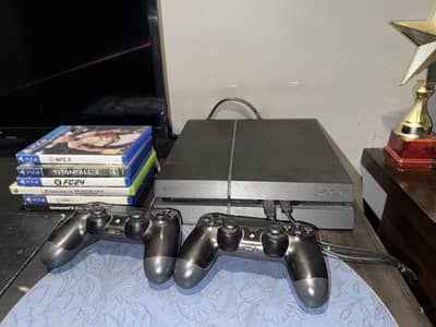 PS4 with 2 original controllers and 5 games