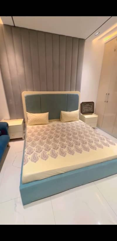 bed , sofa , dressing table , mirror