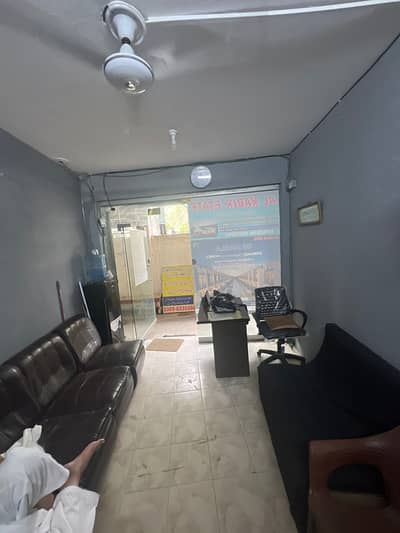 LOWER GROUND SHOP AVAILABLE FOR RENT MAIN 80FT ROAD FAISAL TOWN