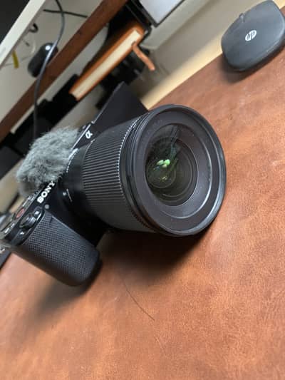 Brand new just opened box Sony zv e10 with sigma 16mm f1.4 lense