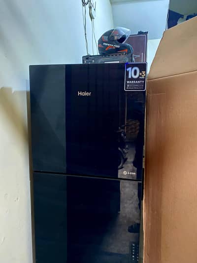 new condition Haier glass dor olny 2 month used  03124119862