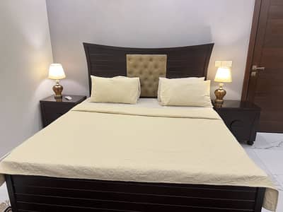 Bed with side tables