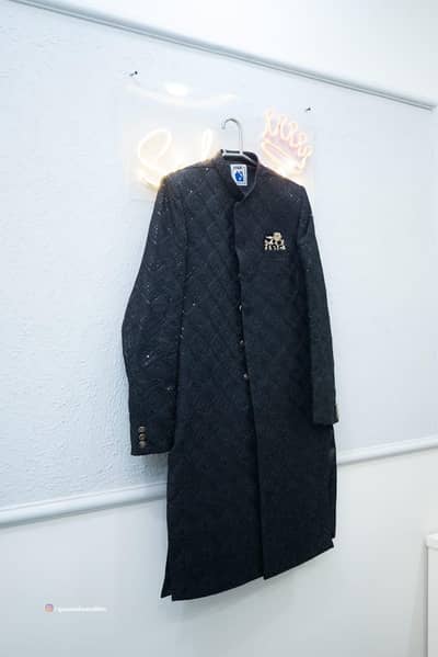 1 time used black sherwani