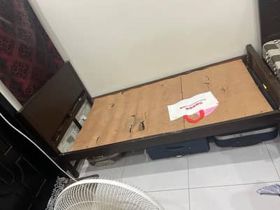 single wooden bed in good condition