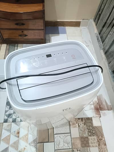 TCL brand new one ton AC inverter, just like new , slightly used