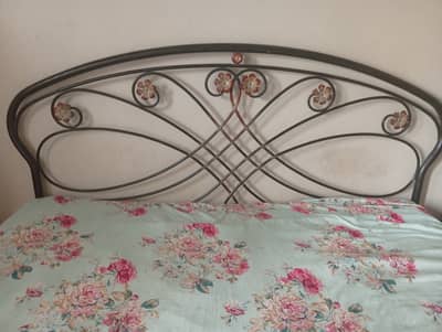 Iron rod bed with Mattress.