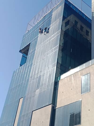 Glass Facade Cleaning | Rope Access & 30ft Rod Cleaning Experts
