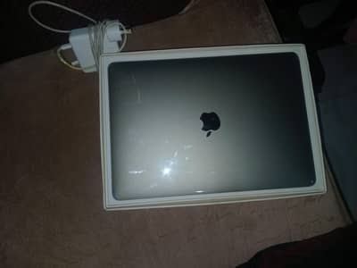 Macbook pro with 10/10 condition and original charger