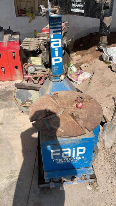 Tyre repairing and air pressure machine