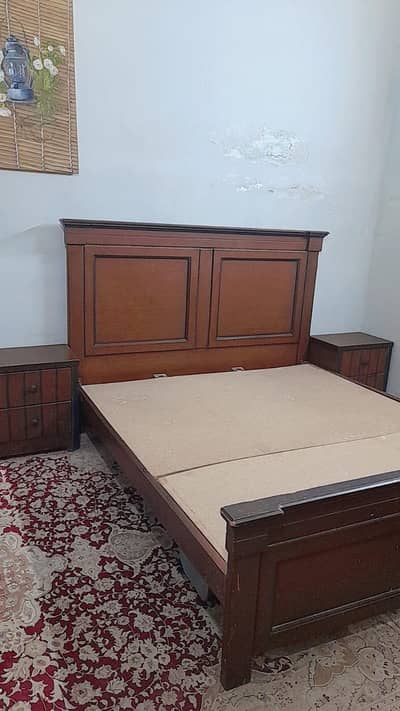 Double bed with side tables without mattress