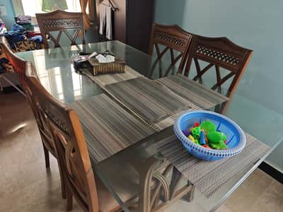 Dining table with glass top and 6 chairs