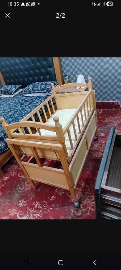 wooden baby cot in good codition