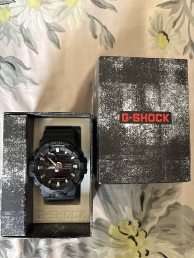 Brand new genuine casio G shock GA-700-1B Box, tags and warranty card.