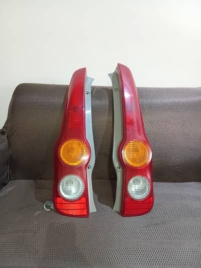 daihatsu mira 2006 back lights and door panels and window machines