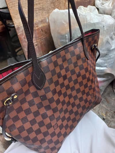 Louis Vuitton Neverfull MM Damier Ebene Tote Bag.