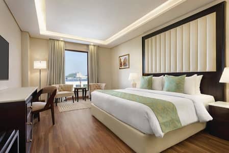 RAMADA HOTEL SUITES | 30 Months Plan | EARN 12% RETURNS | Mall Road Lahore FLAT FOR SALE