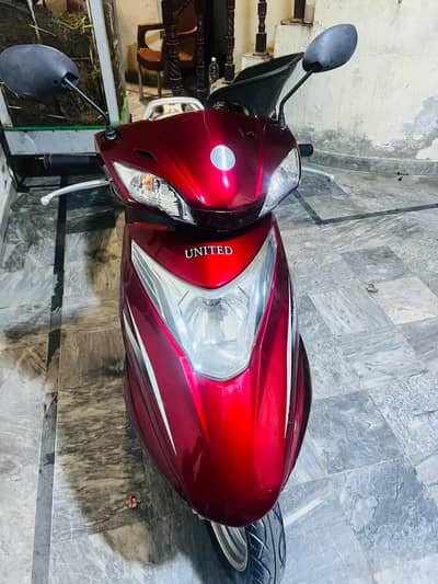 united 2020 self start automatic 100cc petrol scooty