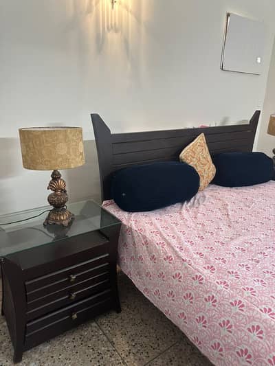 Wooden dark brown  bed