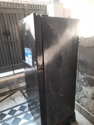 medium size Dawlance refrigerator one year used very good condition