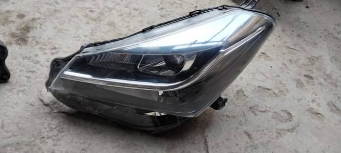 Toyota vitz OEM headlights