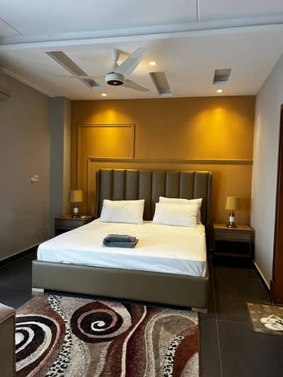 Two bedroom apartment per day available Gulbug green Islamabad lukurya furnished apartment per day