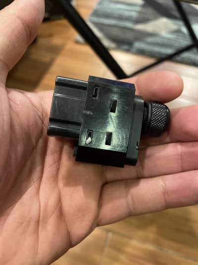 Suzuki swift side mirrors button