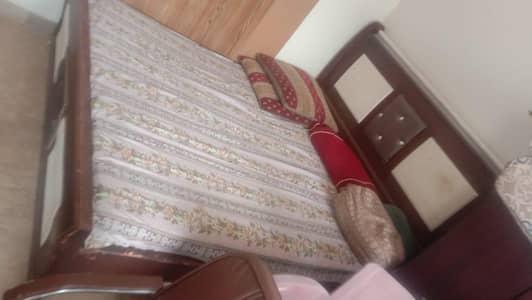 Double bed with dressing