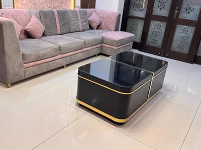 L shaped Sofa with Center Table and Two Puffies