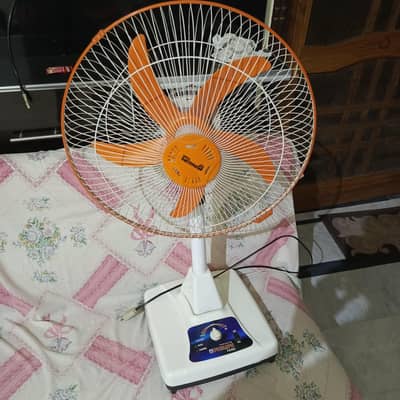 charging fan with new zero mater battery attched in gud condition