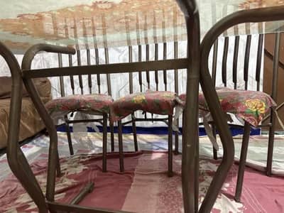 Urgent Sale: Home use dining table with 6 flexible chairs no damage