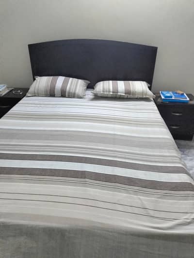 Queen size bed with 2 side tables