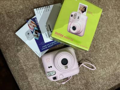 Instax Mini 12 – Like New (Only Used Once)