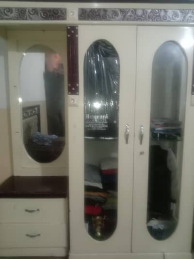 showcase with side table and mirror